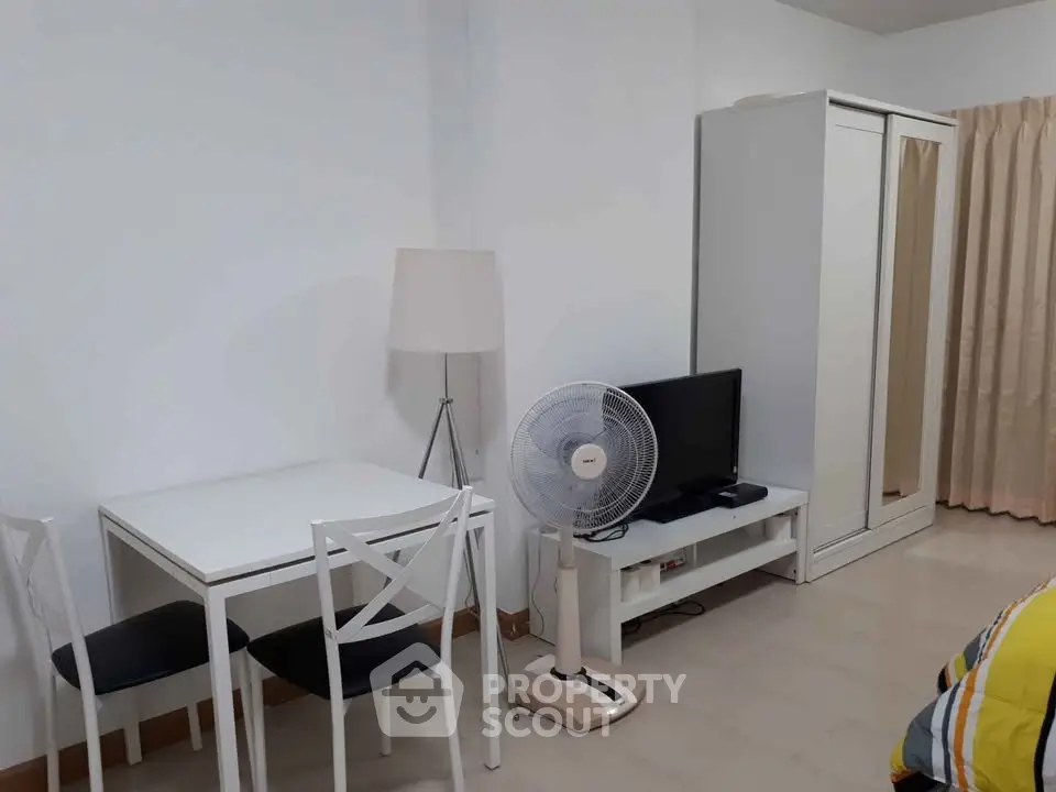 Cozy modern living space with minimalist furniture and neutral tones, perfect for urban living.