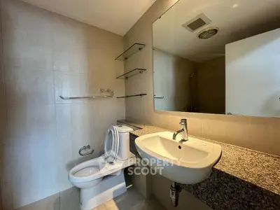 Spacious modern bathroom with sleek fixtures and elegant design