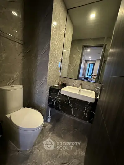 Luxurious marble bathroom with modern fixtures and elegant design