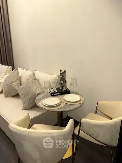 Stylish modern living room with elegant decor and cozy seating area.
