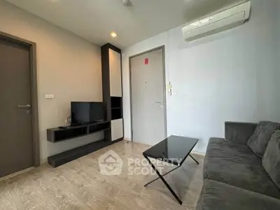 Modern living room with sleek furniture and air conditioning