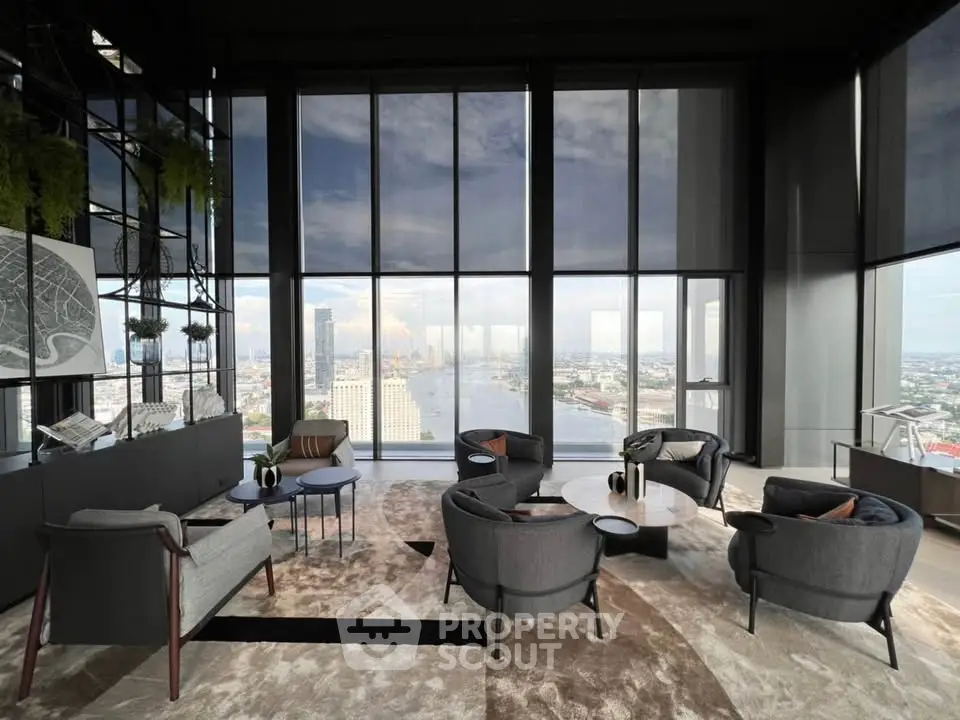 Luxurious high-rise living room with panoramic city and river views, modern furniture, and floor-to-ceiling windows.