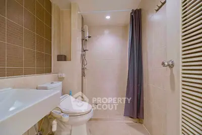 Modern bathroom with sleek design and spacious shower area