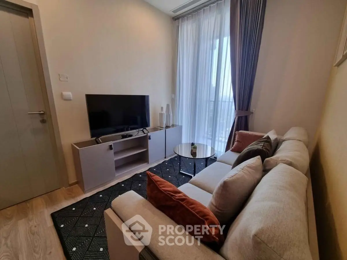 Cozy modern living room with stylish sofa and TV setup