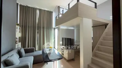 Modern loft apartment with high ceilings and stylish decor