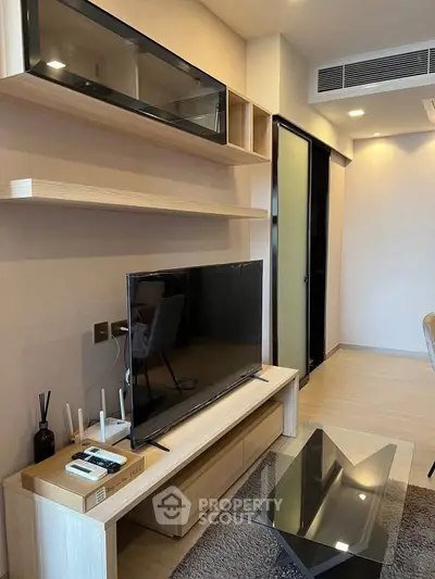 Modern living room with sleek TV unit and stylish decor