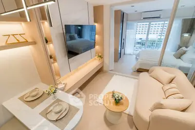 Modern living room with elegant decor and open view to bedroom, featuring stylish furniture and natural light.