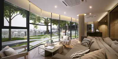 Luxurious living room with panoramic garden view and modern decor