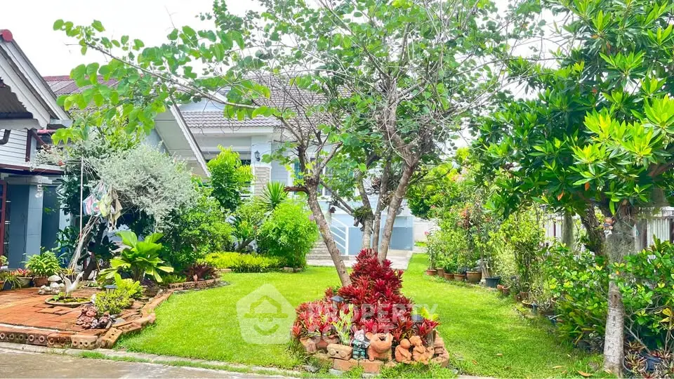 Charming suburban home with lush garden and vibrant landscaping, perfect for nature lovers seeking tranquility.