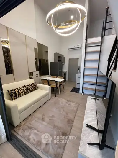 Modern loft apartment with stylish living area and open kitchen layout