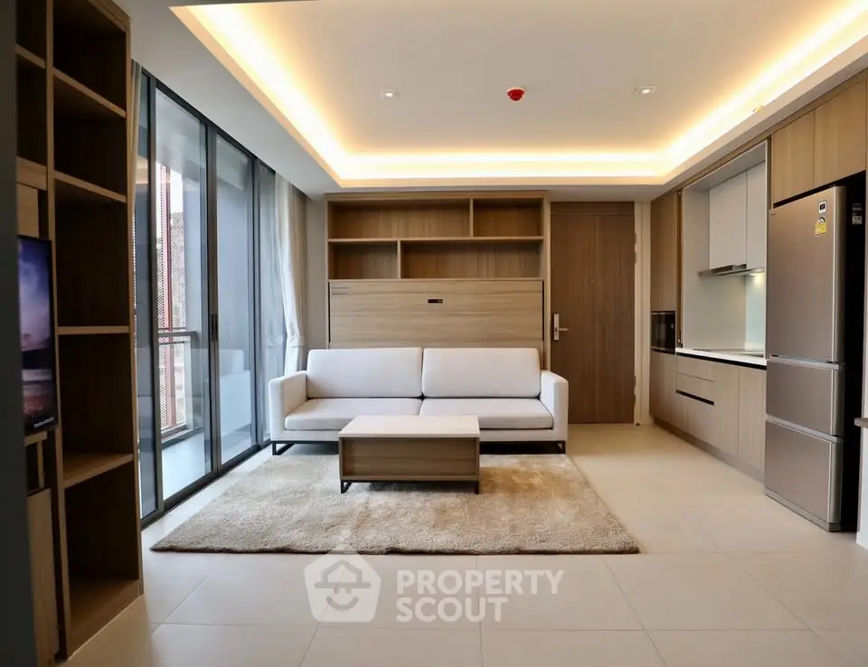 Modern living room with open kitchen and large balcony in luxury apartment