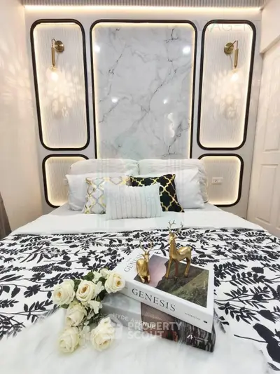 Luxurious bedroom with elegant marble accent wall and stylish decor