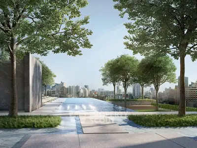 Luxurious rooftop infinity pool with stunning city skyline view and lush greenery.