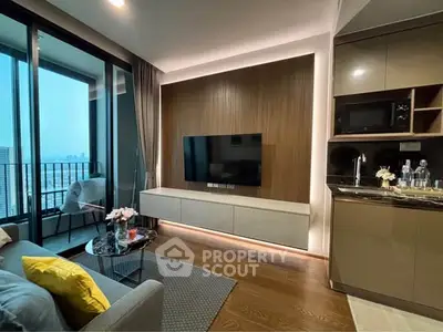 Modern living room with balcony view and sleek kitchen design