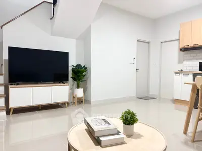 Modern living room with sleek TV setup and minimalist decor