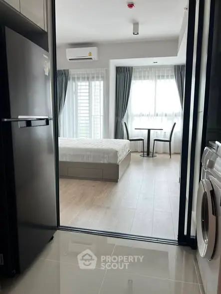 Modern studio apartment with sleek design and natural light