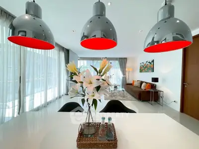 Modern living room with stylish lighting and elegant decor