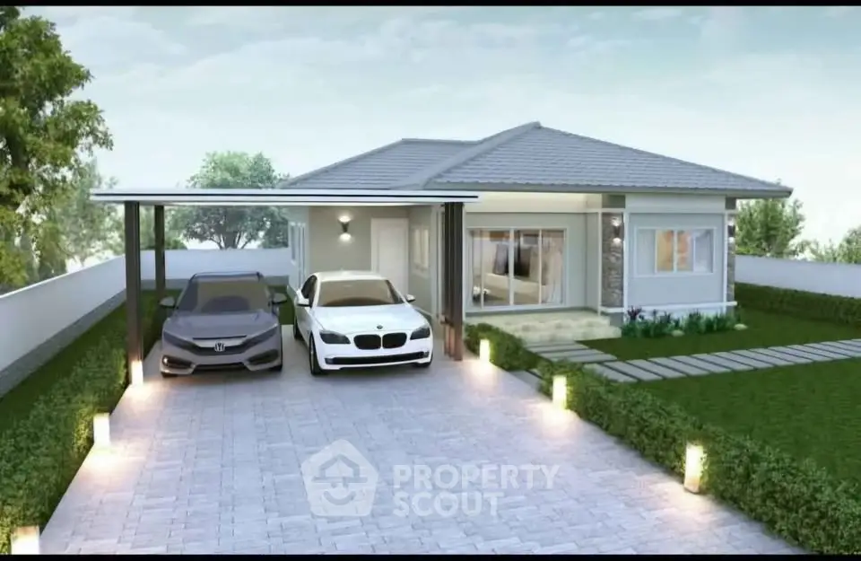 Modern single-story house with two-car garage and landscaped driveway