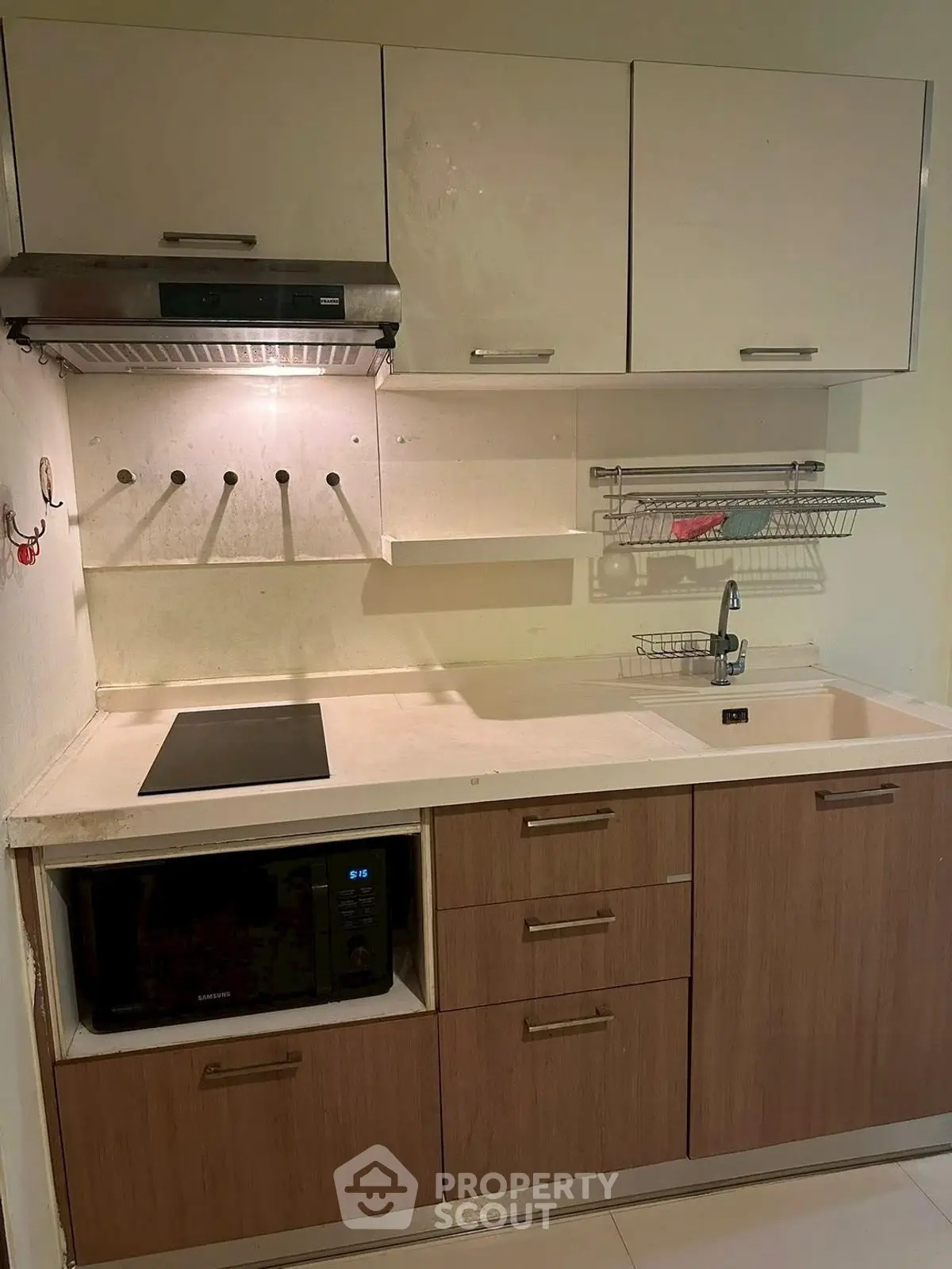 Modern kitchen with sleek cabinetry and built-in appliances