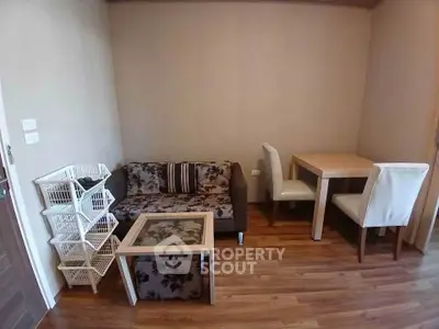 Cozy living room with stylish furniture and wooden flooring