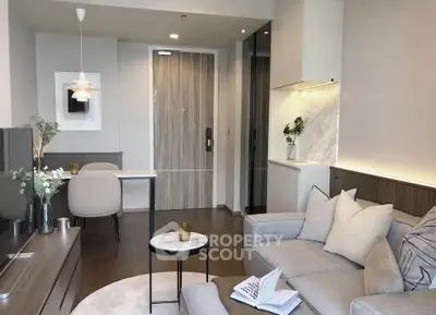 Modern living room with cozy sofa, stylish decor, and open layout in a contemporary apartment.