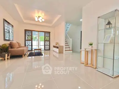 Spacious modern living room with elegant decor and natural light