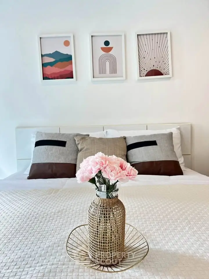Elegant bedroom with stylish decor and cozy bedding, perfect for relaxation and comfort.