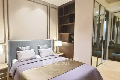 Elegant bedroom with modern design and mirrored wardrobe