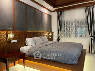 Luxurious bedroom with elegant wood paneling and ambient lighting