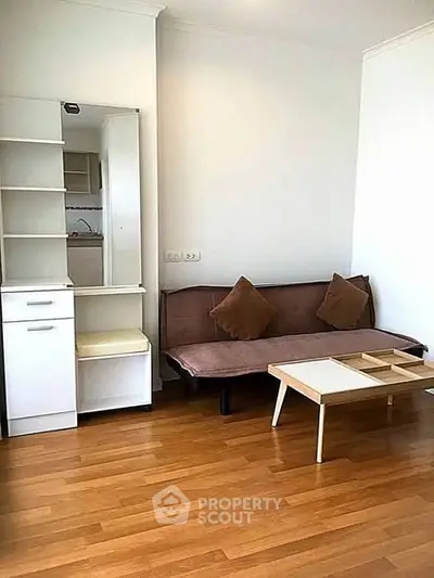 Cozy living room with modern furniture and wooden flooring