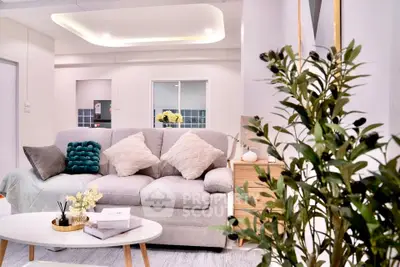 Modern living room with stylish decor and cozy seating area