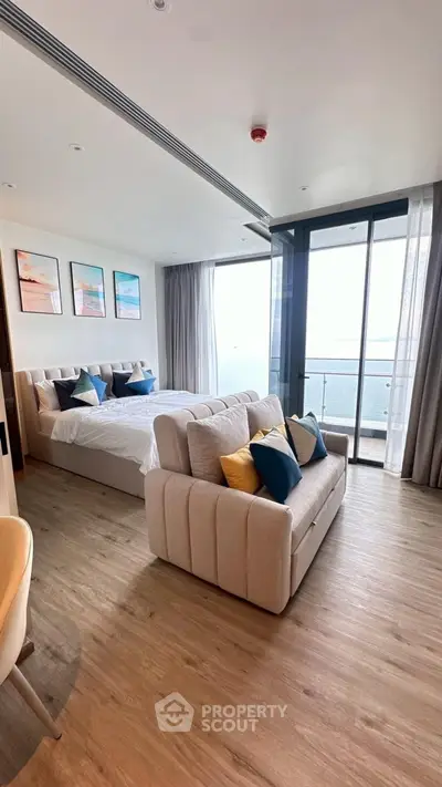 Luxurious bedroom with stunning ocean view and modern decor