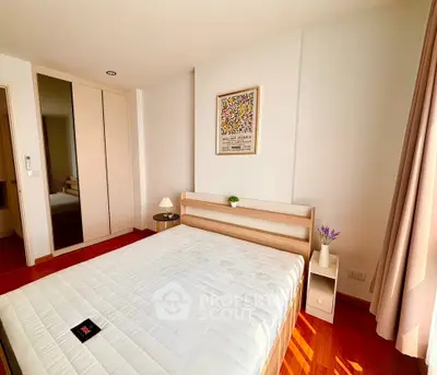 Bright and cozy bedroom with modern decor and ample natural light