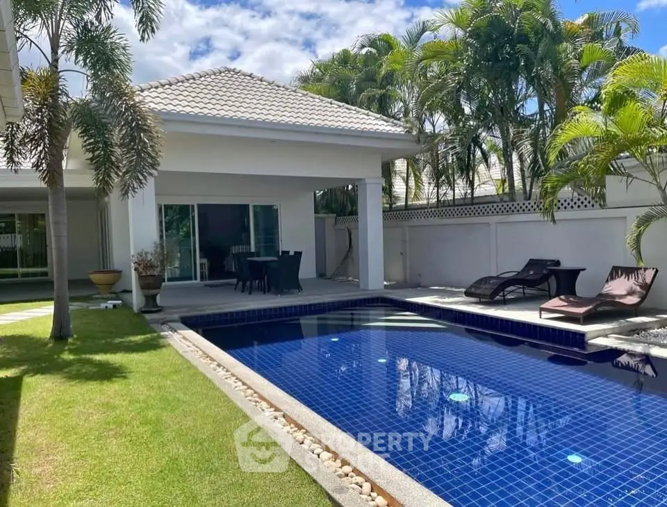 Luxurious villa with private pool and lush garden, perfect for relaxation and entertaining.
