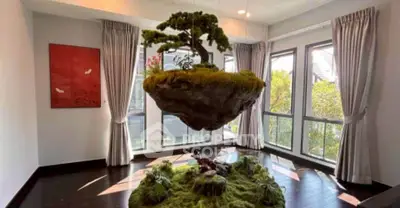 Stunning living room with unique floating garden feature and large windows.