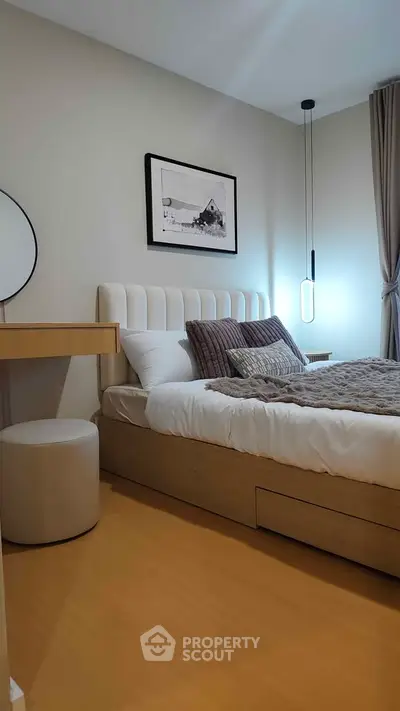 Cozy modern bedroom with stylish decor and ambient lighting