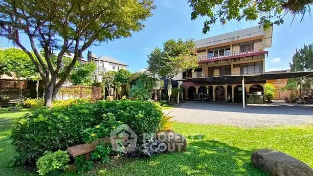 Charming property with lush garden and spacious building, perfect for serene living.