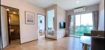 Modern living room with balcony view and stylish decor