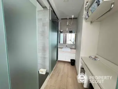 Modern bathroom with sleek design and frosted glass partitions