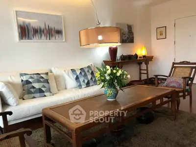 Charming living room with elegant decor and cozy seating area, perfect for relaxation and entertaining.