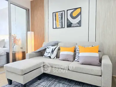 Modern living room with stylish decor and cozy sofa in a contemporary apartment.