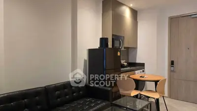 Modern apartment interior with sleek kitchen and cozy living area