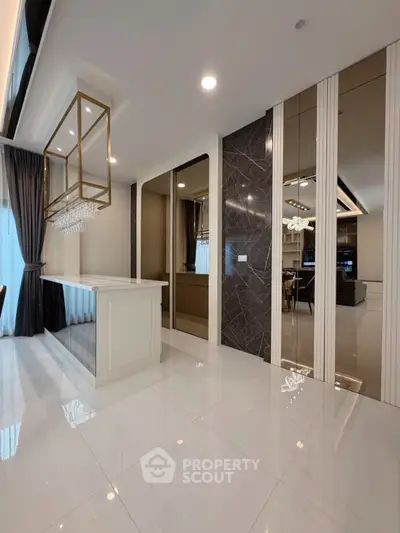 Luxurious modern kitchen with sleek design and elegant lighting