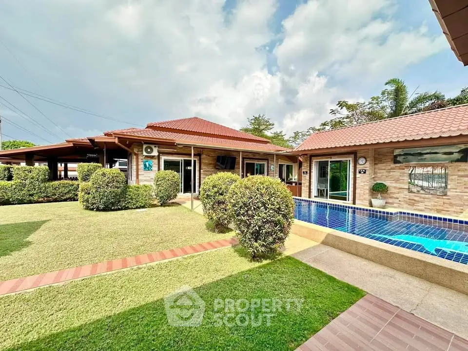 Luxurious villa with private pool and lush garden, perfect for serene living.