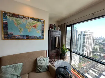 Cozy living room with city view and world map decor