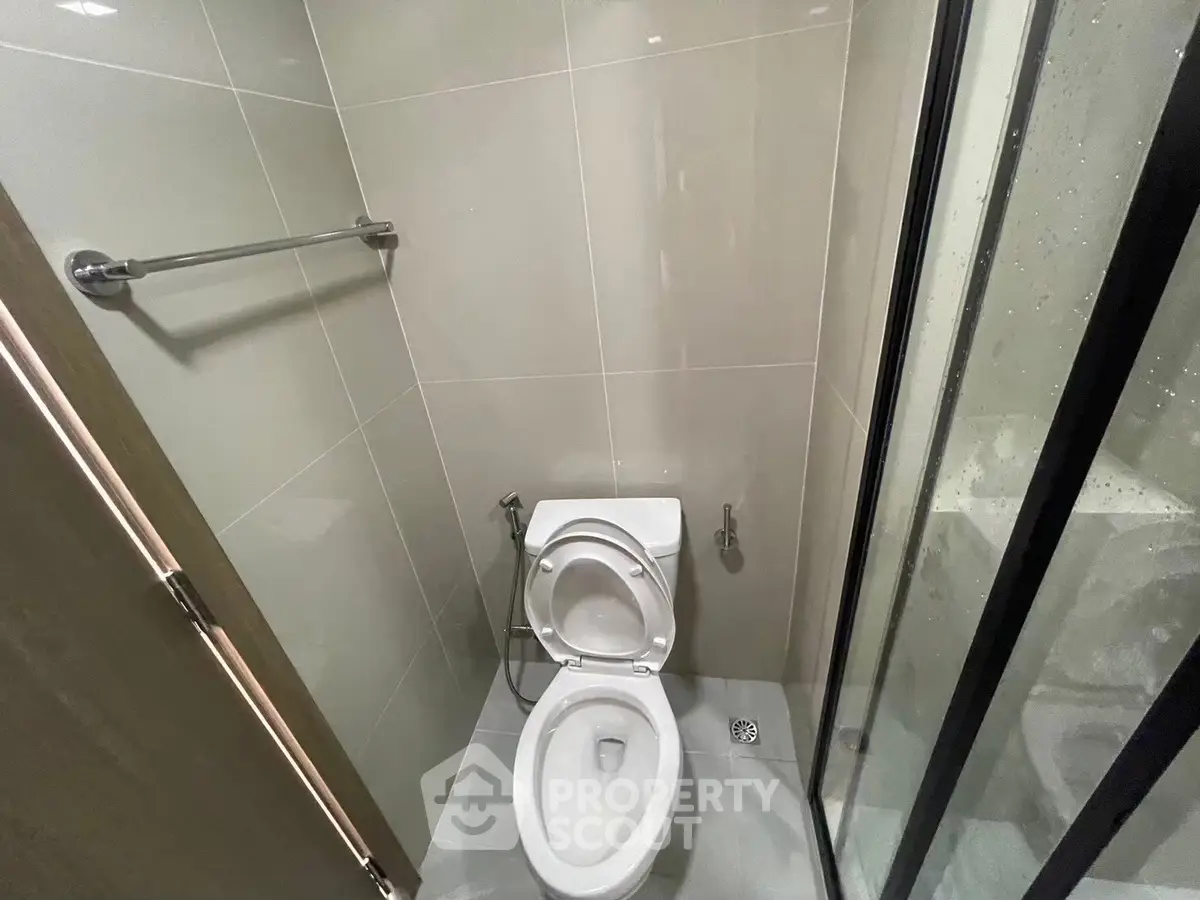 Modern bathroom with sleek design and glass shower enclosure
