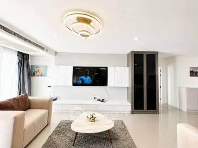 Modern living room with sleek design and stylish lighting