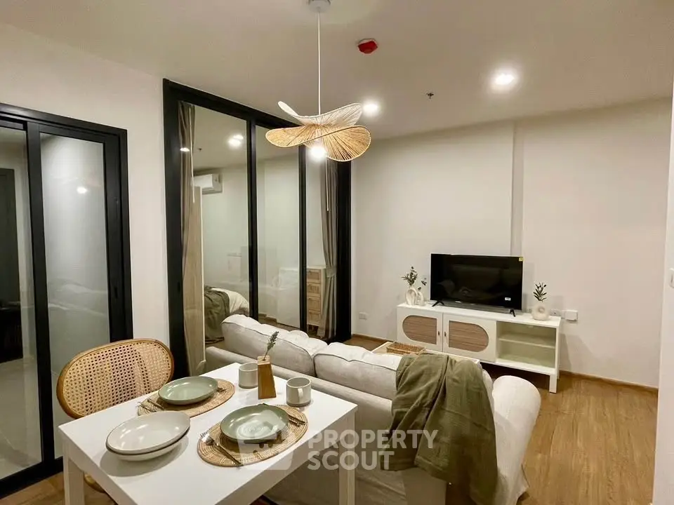 Modern living room with cozy dining area and stylish decor