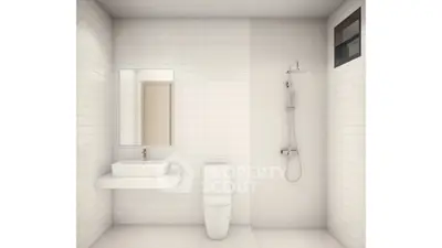 Modern minimalist bathroom with white tiles and sleek fixtures.