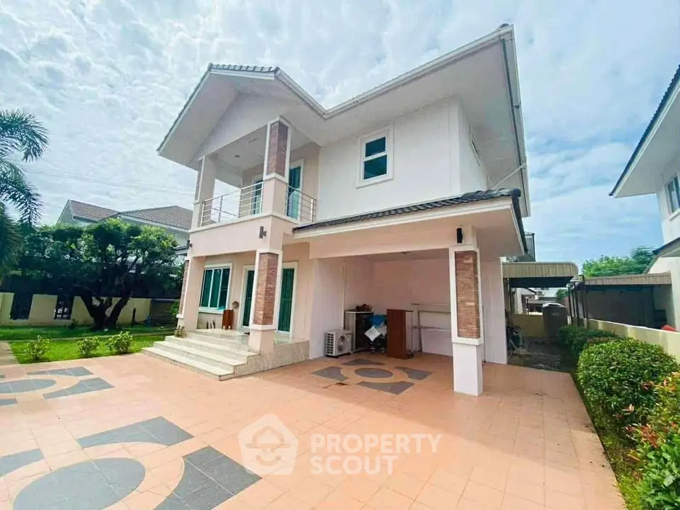 Stunning two-story modern house with spacious driveway and lush garden